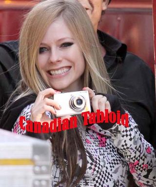 Avril Lavigne in a good mood while on set of her new commercial For Kohl's
